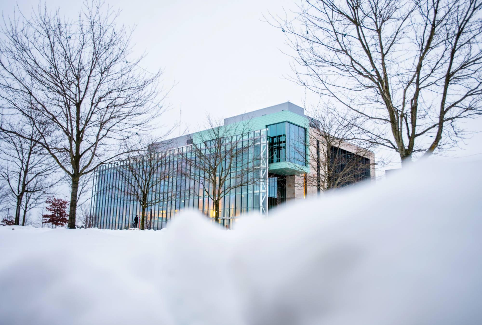 The Mary Idema Pew Library on GVSU's Allendale Campus in the winter with snow on the ground